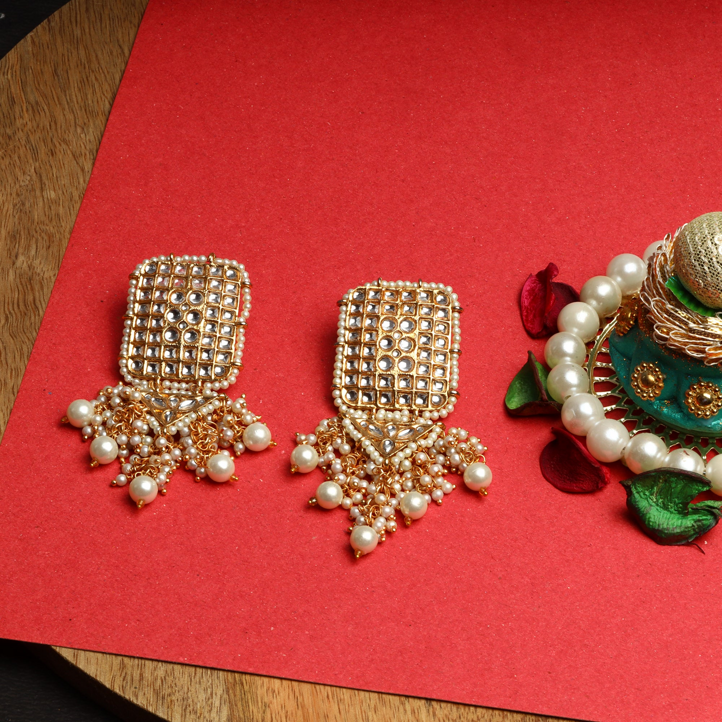 Janya- Stone Studded Hanging Pearl Jhumki Earrings