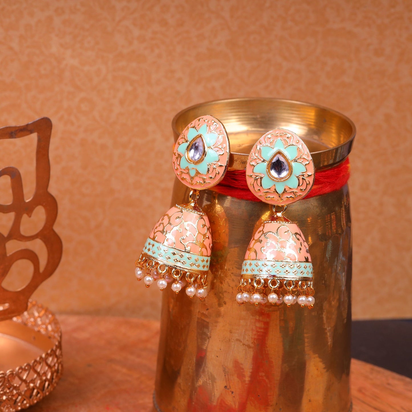 Advika- Stone Studded Hanging Pearls Jhumka Earrings(Peach Puff)