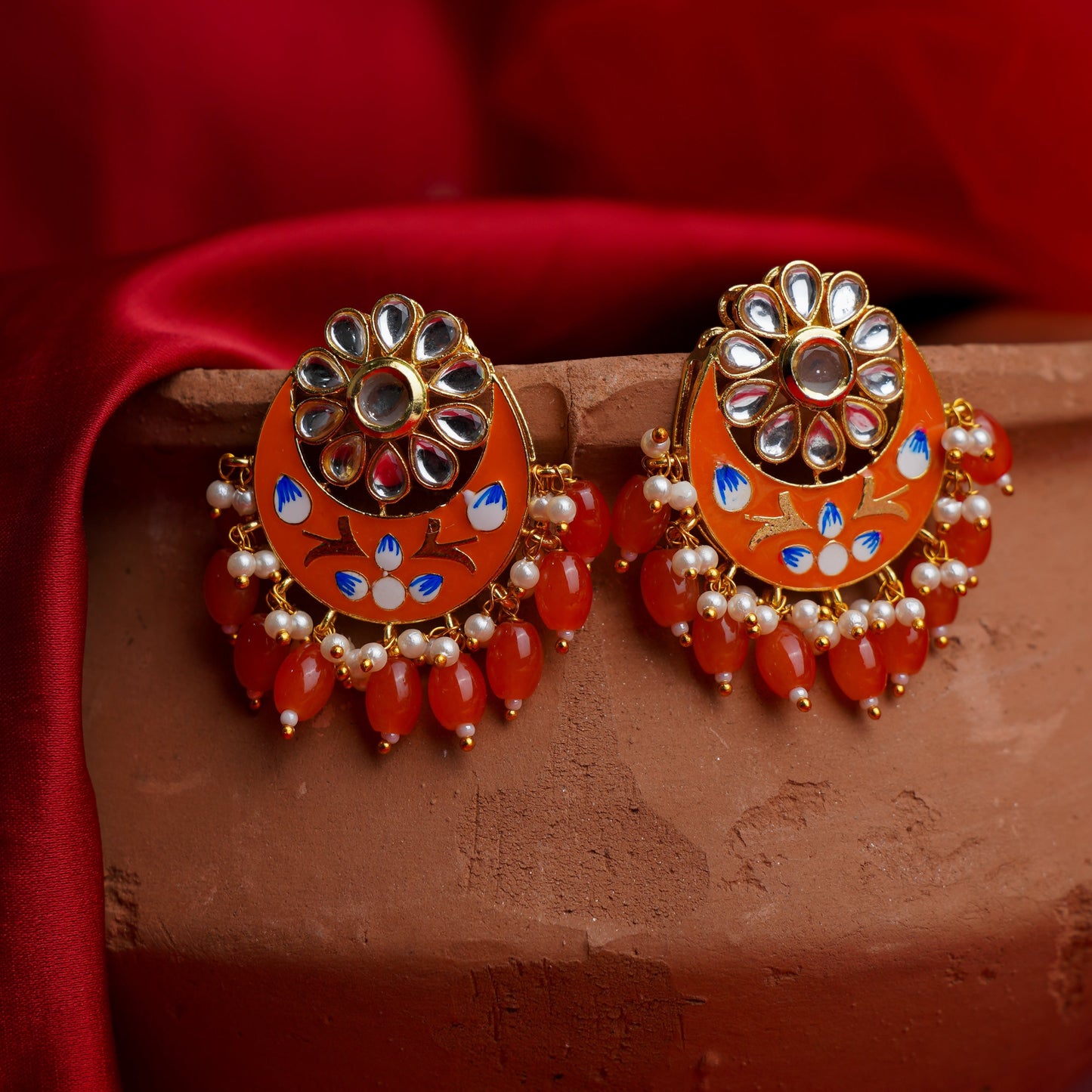 Aarvi- Stone Studded Dangler Earrings(Orange)