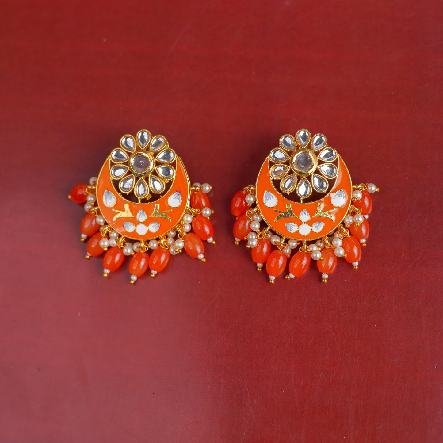 Aarvi- Stone Studded Dangler Earrings(Orange)