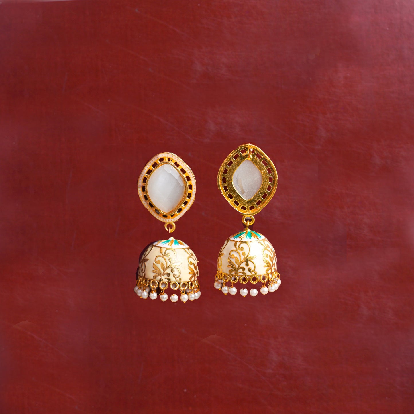 Aayushi- Stone Studded Hanging Pearl Jhumka Earrings