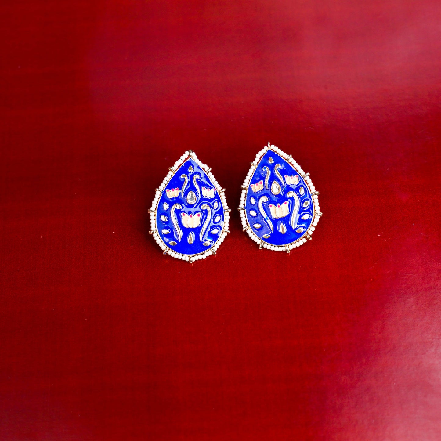 Alaya- Pearl Framed Drop Shaped Stud Earrings(Blue)