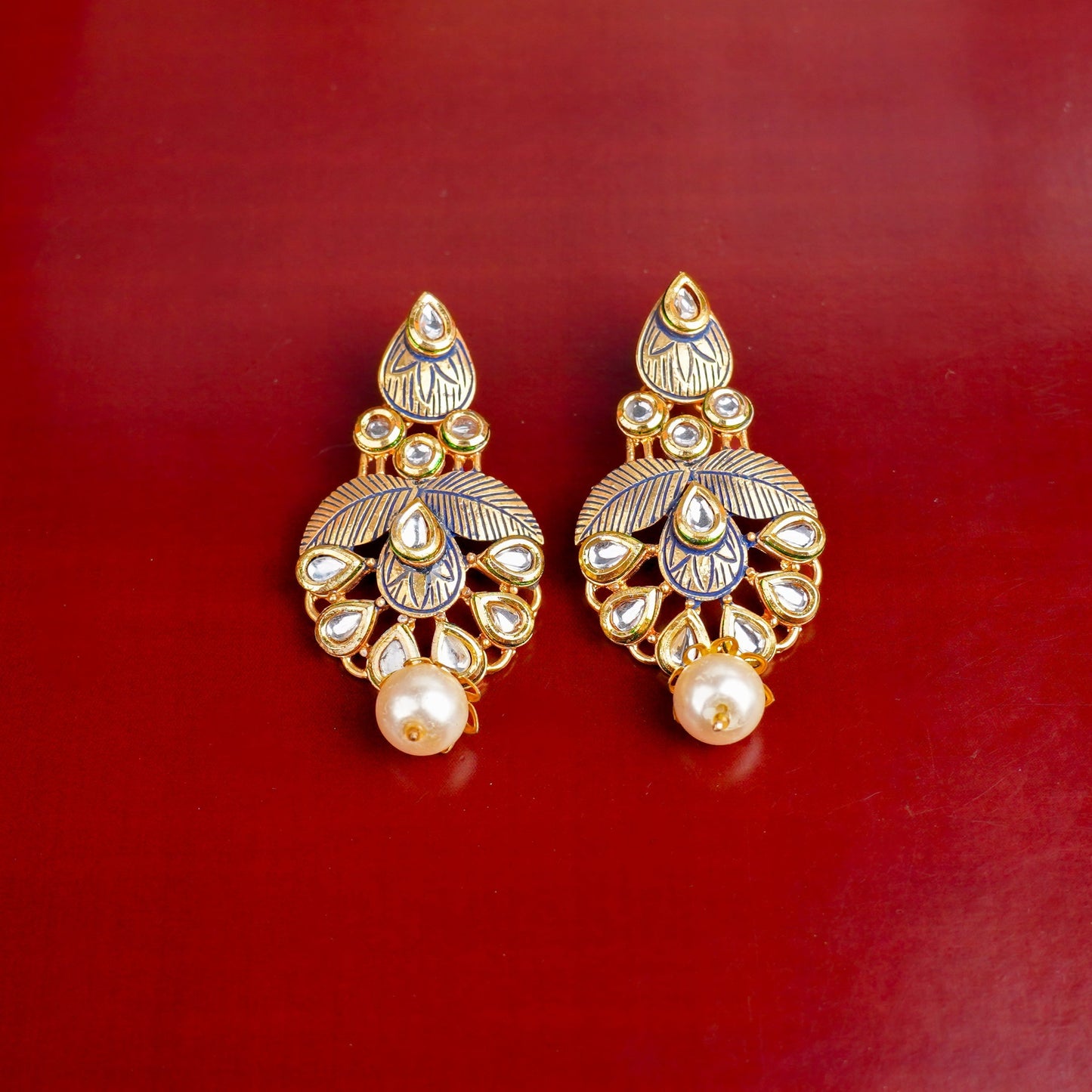 Amoli- Hangigng Pearl Dangler Earrings