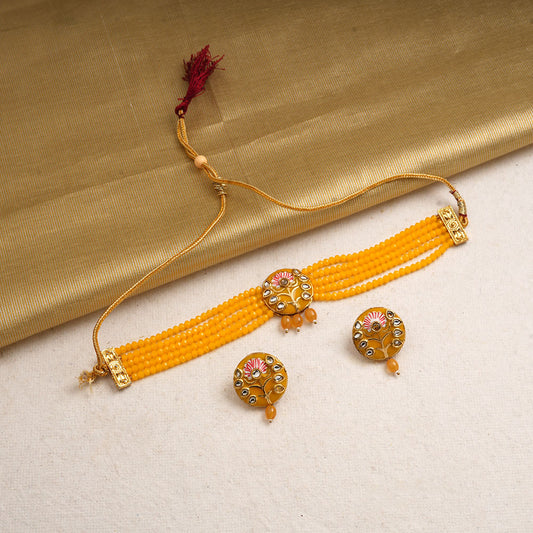 Indira- Stone Studded Hanging Pearl Beaded Neckpiece Set