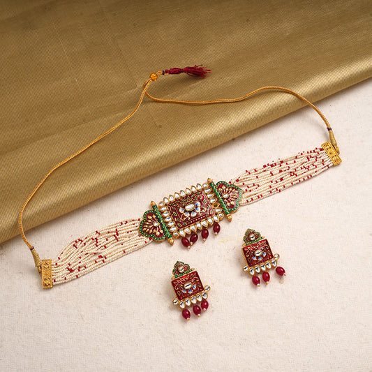 Ishani- Stone Studded Hanging Pearl Beaded Neckpiece Set (Red)