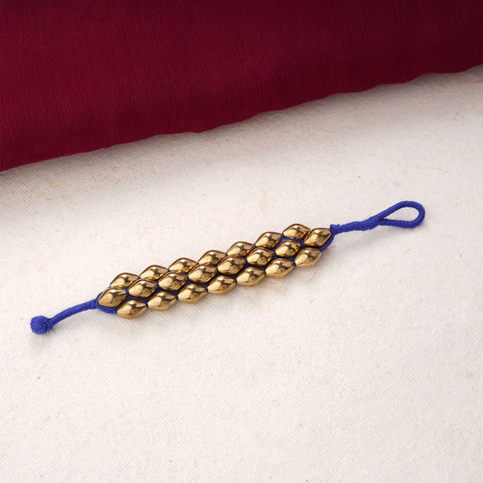 Abhilasha- Golden Pearl thread Bracelet